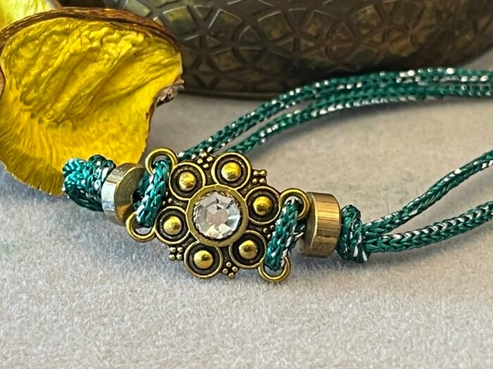 Misa Emerald Gold Rakhi