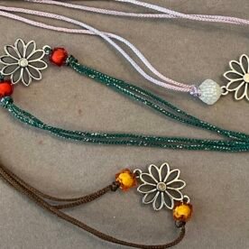 Misa Silver Floral Rakhi 4 IMG 4597 Original scaled 1