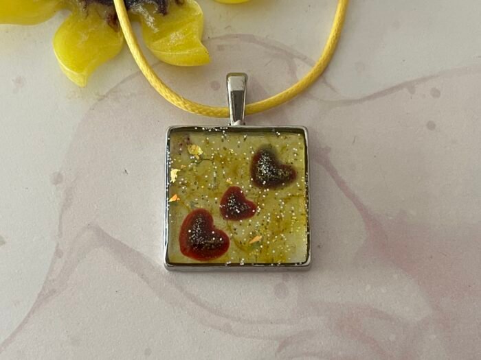 Necklace- Misa Cornus Pendant- Yellow base with Red Hearts and Silver shimmer