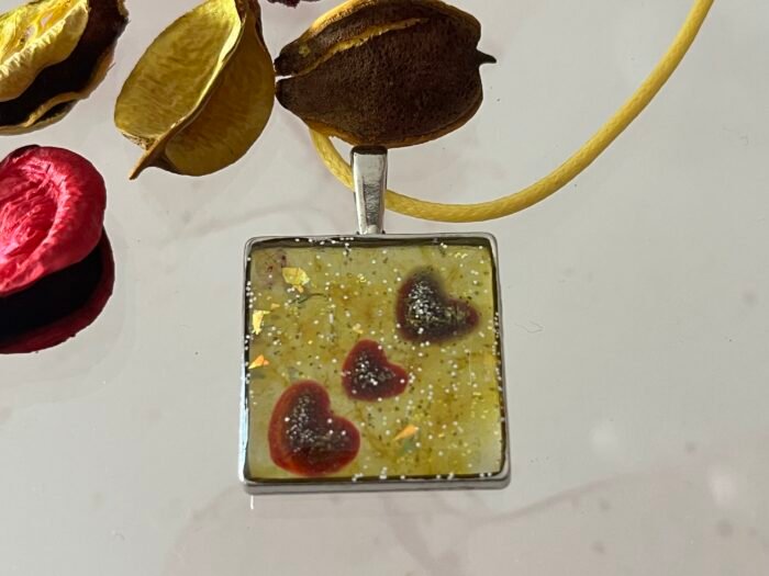 Necklace- Misa Cornus Pendant- Yellow base with Red Hearts and Silver shimmer - Image 4