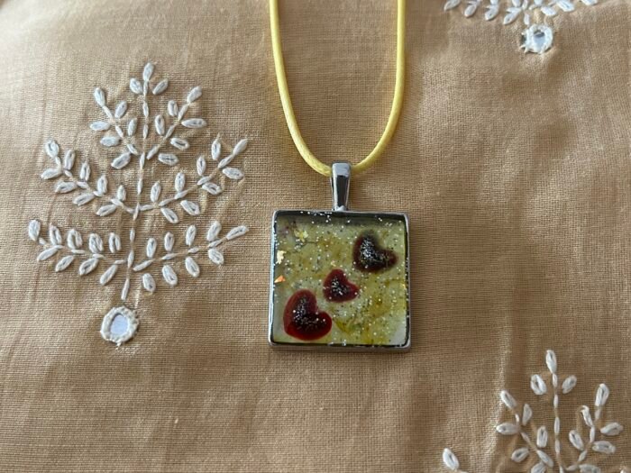 Necklace- Misa Cornus Pendant- Yellow base with Red Hearts and Silver shimmer - Image 2