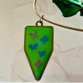 Necklace- Misa Cornus Drop Pendant with Beige Cord Chain- Green base, Pink & Blue Butterflies 3 IMG 6756