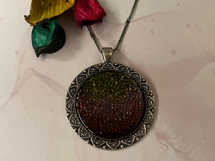 Necklace- Misa Allium Pendant with Fancy Silver Chain- Metallic Black base, Gold, Pink &  Red Glass beads